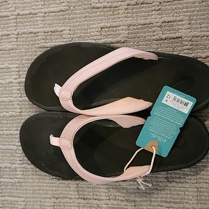 NEW woman's  OLUKAI flip-flops.  Pink. Size 12W.